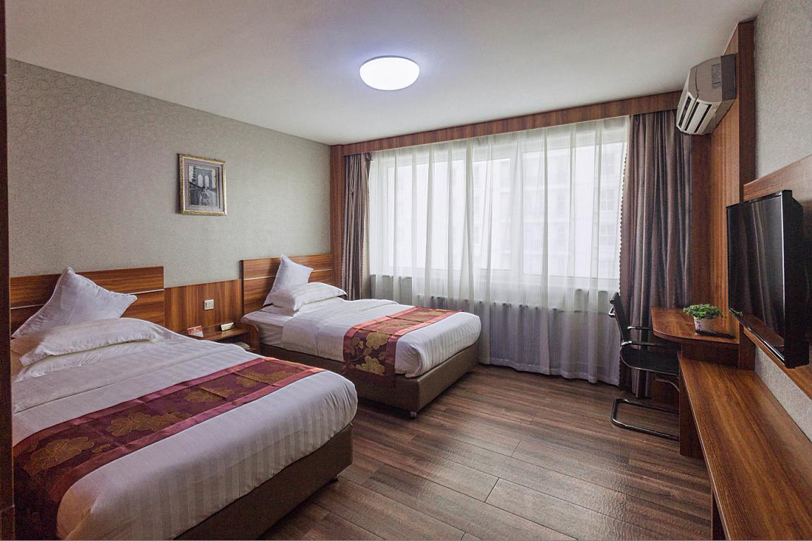 Beiguo Zhichun Business Hotel Mancsouli Kültér fotó
